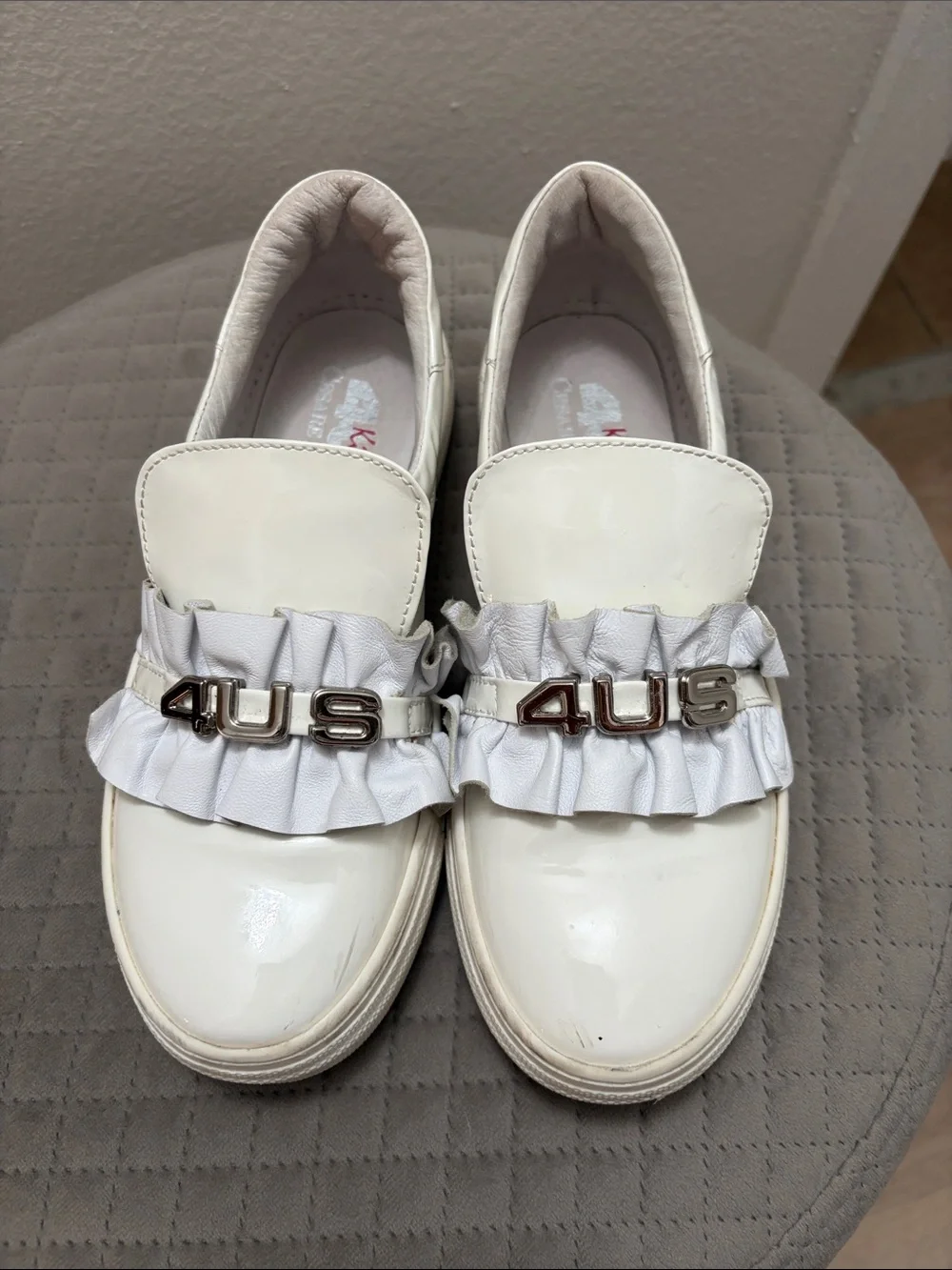 Cesare Paciotti White Patent Leather Slip-Ons with Ruffle Detail